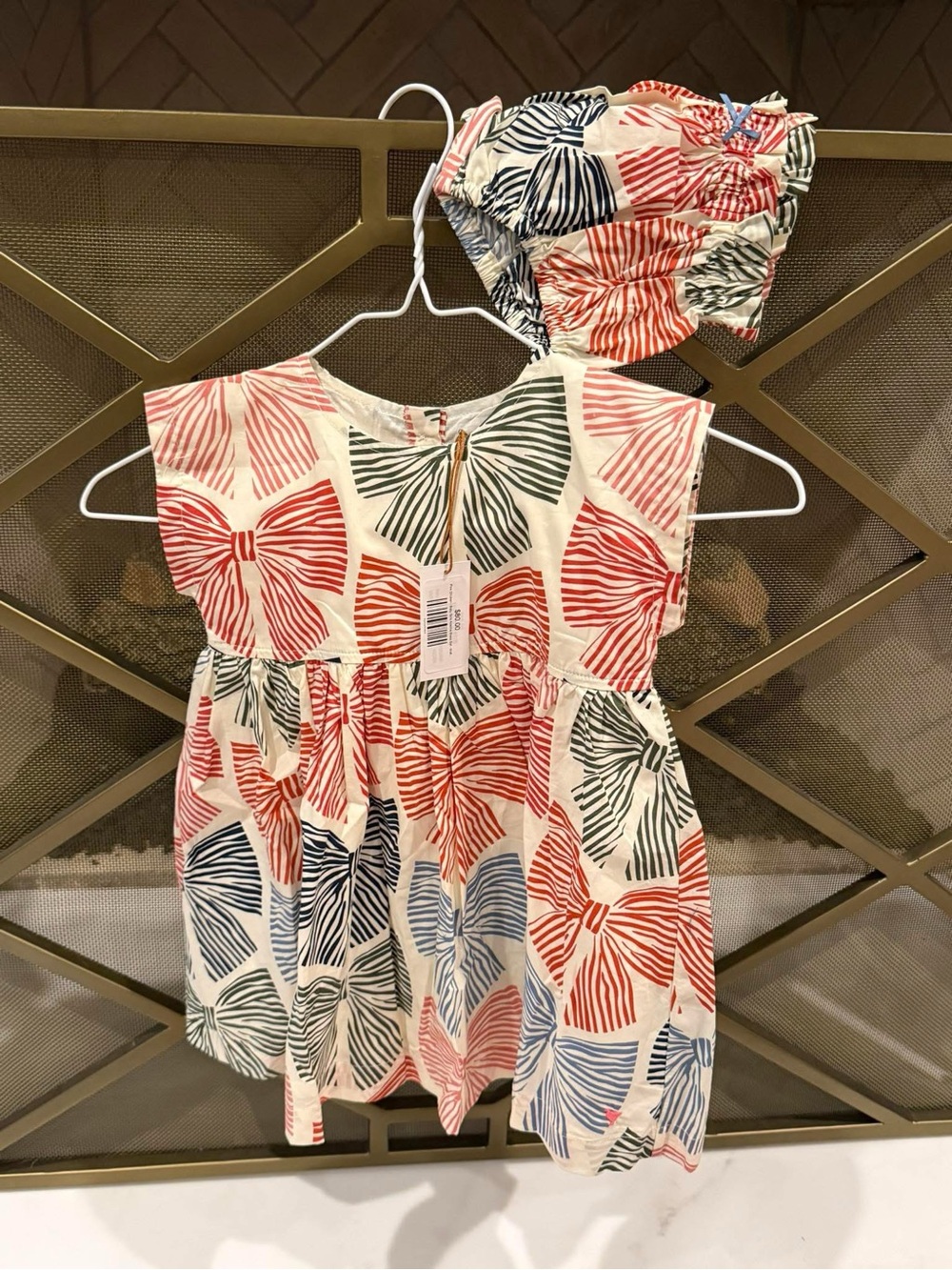 Pink Chicken Girls Cream Dress with Red, Blue & Green Bow Print